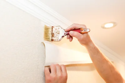 Pose de papier peint à Boust — revêtements muraux et toiles de verre